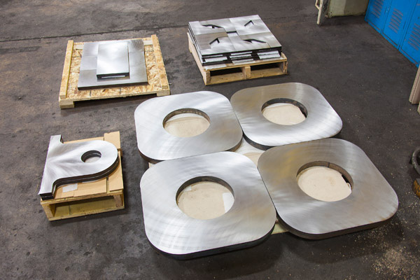 Finished precision-ground steel parts prepared for shipment